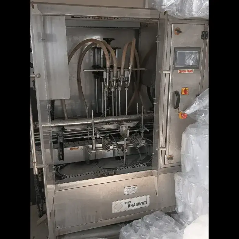4 Head Volumetric Filling Machine